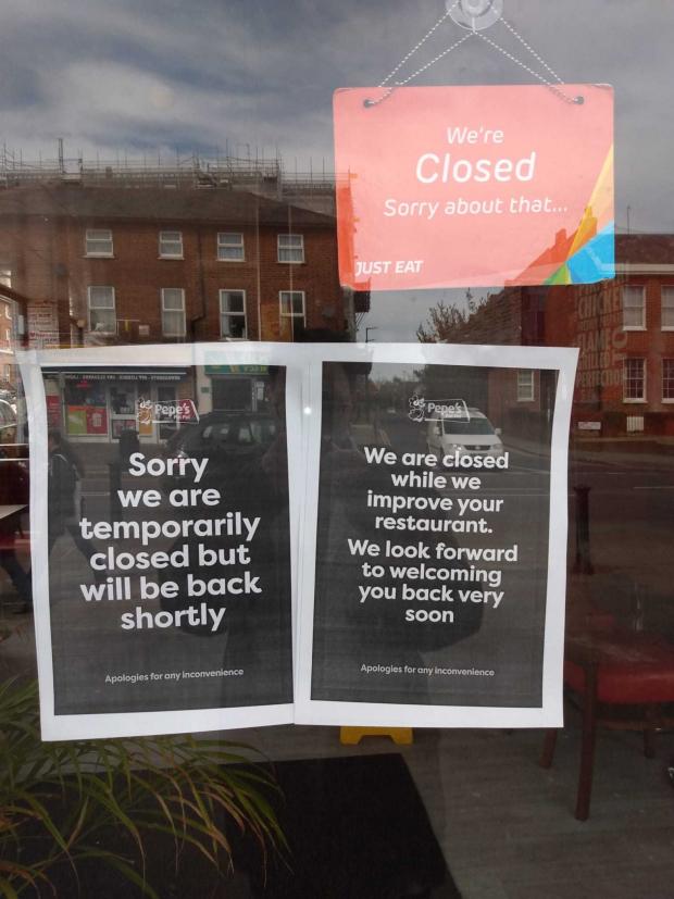 Reading Chronicle: A notice stating that Pepe's Piri Piri in Reading is currently closed for refurbishment works. Credit: James Aldridge, Local Democracy Reporting Service