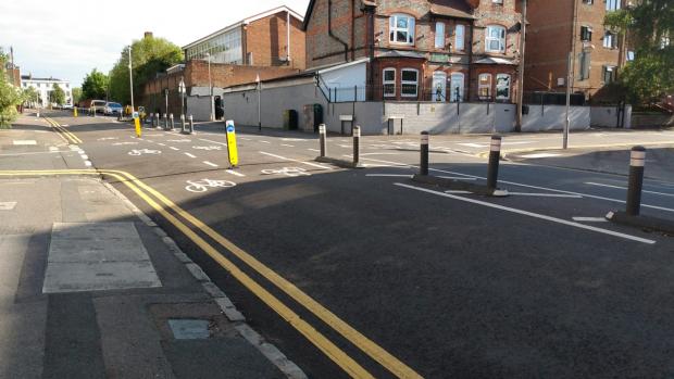 Reading Chronicle: The dual way cycle lanes in Sidmouth Street. Note the barriers which prevent larger vehicles driving into the lane. Credit: James Aldridge, Local Democracy Reporting Service