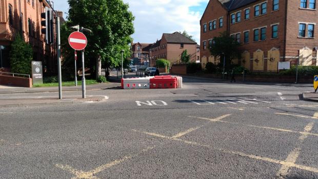 Reading Chronicle: The triangular barrier at the junction of Queens Road and Sidmouth Street preventing drivers using the northbound lane. Credit: James Aldridge, Local Democracy Reporting Service
