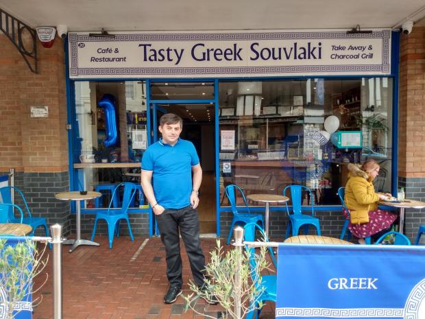 Reading Chronicle: Luftar Rusta, the owner of Tasty Greek Souvlaki in Reading town centre. Credit: James Aldridge, LDR