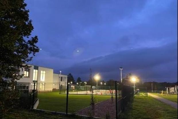 The light coming from the Multi Use Games Area (MUGA) at The Heights Primary School in Mapledurham Playing Fields. Credit: Martin Brommell, Warren & District Residents Association