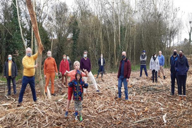Neighbours and Liberal Democrats protesting after the land, which they refer to as \'Swallows Meadow\' was \'deforested\' by contractors in November 2020. Credit: Wokingham Liberal Democrats