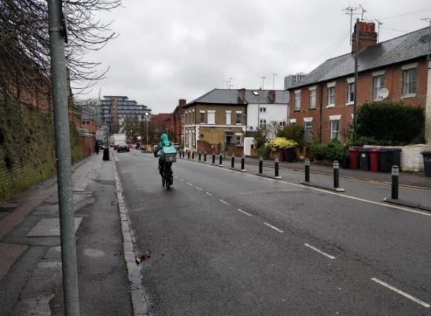 Reading Chronicle: A Deliveroo cyclist chose not to use the Sidmouth Street cycle lane. Credit: KMC Transport Planning