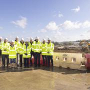 Councillors, Paul Inman, the Pro-Vice-Chancellor of the University of Reading and Curo Construction team members at Shinfield Studios. Credit: Shinfield Studios / Jaques PR