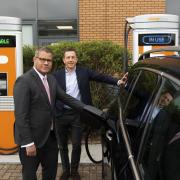 Rt Hon Alok Sharma and Pasquale Romano, CEO of ChargePoint, operating a ChargePoint station. Credit: Clarity Global
