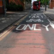 A combined cycle, bus and taxi lane in Reading. Credit: James Aldridge, Local Democracy Reporting Service