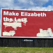 A picture of a defaced billboard in Reading, taken by Ian Adamson
