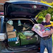 Ronnie Goodberry and a car full of donated items