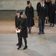 James, Viscount Severn and Lady Louise Windsor paying their respects as the coffin of Queen Elizabeth II lies on the catafalque in Westminster Hall.