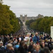 Pictures from Windsor as crowds await the procession of the Queen's coffin