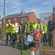 Residents have planted lavenders and wildflowers on the site where the 5G mast is proposed in Emmer Green.