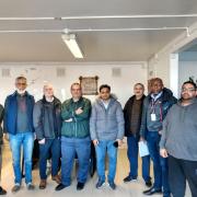 Members of the Reading Private Hire Association and council officers. L to R: Pervaz Akhtar, Manzoor Hussain, licensing officer Clyde Mason, chairman Kamran Saddiq, Sikandar Hayat, Aqeel Kayani, licensing officer Anthony Chawama and Salman Kayani. Cr