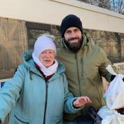 Nick Tenconi with a civilian woman called Olga during the Vans Without Borders mission to The Donbas region in Ukraine. Credit: Nick Tenconi