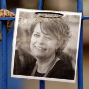 A photograph of Ruth Perry was attached to the fence outside John Rankin School in Newbury, Berkshire (PA)