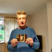 Gary Brookin with the photo of his mum Gladys at the council house they shared in Vale Crescent, Tilehurst. Credit: James Aldridge, Local Democracy Reporting Service