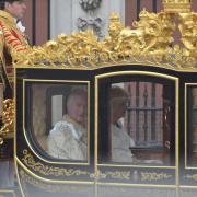 PICTURED: The King and Queen leave Buckingham Palace for coronation procession