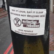 A fake Extinction Rebellion sticker seen in Reading town centre. Credit: Dr John Grout