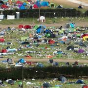 The clean-up operation still underway at the site of Reading Festival