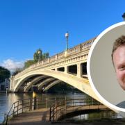 Jason Brock, the council leader, set amongst Reading Bridge, which is 100 years old.