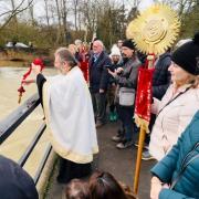 The cross representing Jesus Christ dangled above the River Thames for the Orthodox Christian blessing for Epiphany, the first time the Orthodox community in Reading have conducted the ritual. Credit: Prophet Elias Greek Orthodox Church Reading