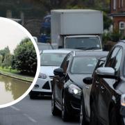Traffic queues and inset, the River Thames. Reading Borough Council wants a third bridge to be built to help ease traffic.