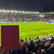 Reading fans stage latest Dai Yongge protest with red cards against Port Vale