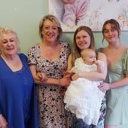 Local family welcomes fourth generation with new baby's christening