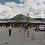 The assault is alleged to have occurred at Reading railway station (pictured)
