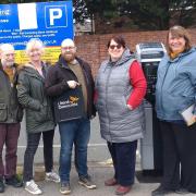 Reading Liberal Democrat campaigners at the Dunstall Close car park in Tilehurst, where free 30 minute parking has been abolished. Credit: Reading Liberal Democrats [Ricky Duveen, Meri O'Connell, James Moore, Anne Thompson and Helen Belcher]