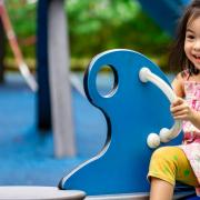 A stock image of a girl enjoying herself in a play area. Credit: Provided by Reading Borough Council