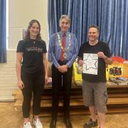Dene Wooton, right, with Tony Page, the Mayor of Reading, and Amy Howard, coordinator of Slimming World in Emmer Green.