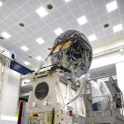 photo issued by the European Space Agency of the EarthCARE satellite undergoing last checks at Airbus's facilities in Friedrichshafen, Germany.