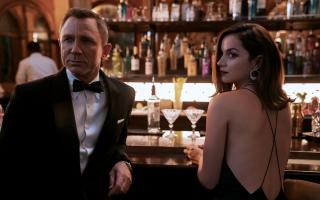 Daniel Craig as James Bond and Ana de Armas as Paloma. Credit: PA