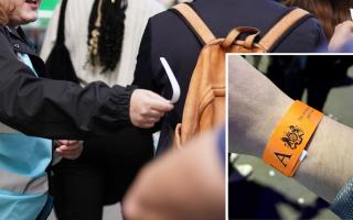 File photos of wristbands handed out during the queue to see the Queen lying in state