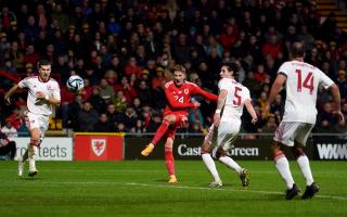 Reading midfielder to remain with Wales senior squad after Man of Match debut display