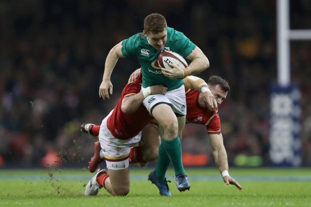 Ireland's Paddy Jackson (centre) is tackled by Wales' Scott Baldwin and Gareth Davies (right) during the RBS Six Nations at the Principality Stadium, Cardiff. PRESS ASSOCIATION Photo. Picture date: Friday March 10, 2017. See PA story RUGBYU